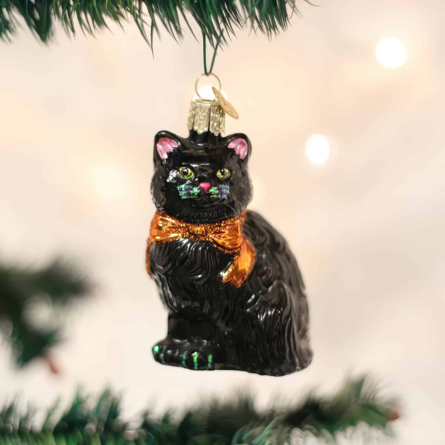 Black cat Halloween ornament with orange accents
