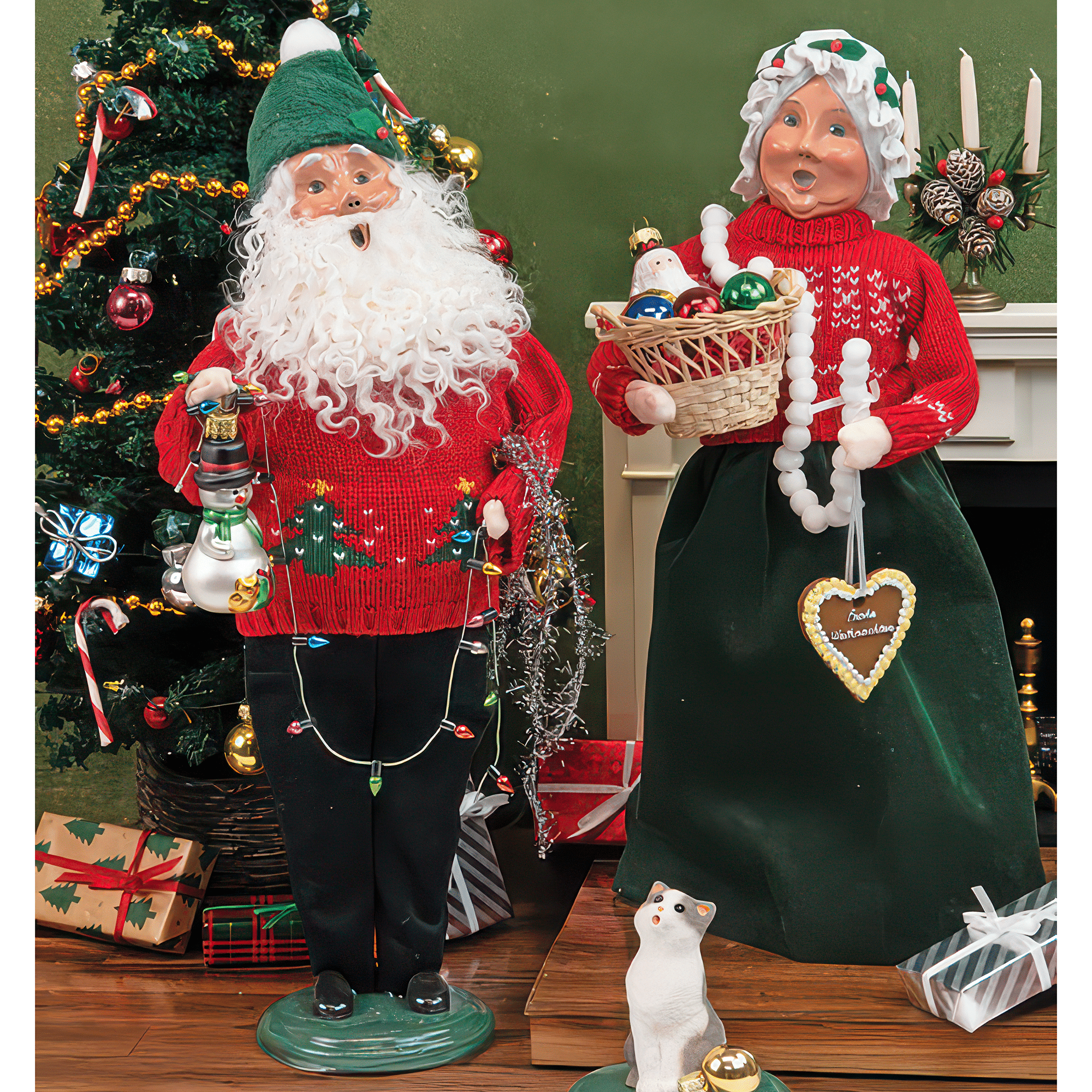 Byers' Choice Decorating Mr. and Mrs. Claus Carolers with garland and a basket of ornaments