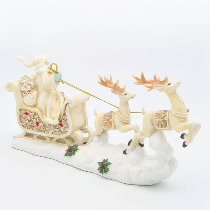 Santa Sleigh with Reindeer Poinsettia Design Figurine Front