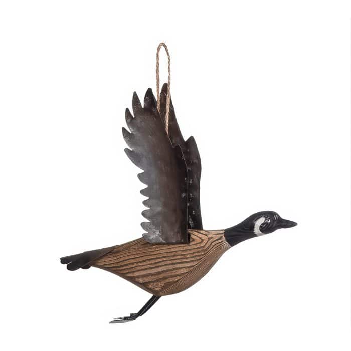 Decorative Metal Bird Sculpture in Flight with a Rope Hanger and Wood grain Body Against a White Background